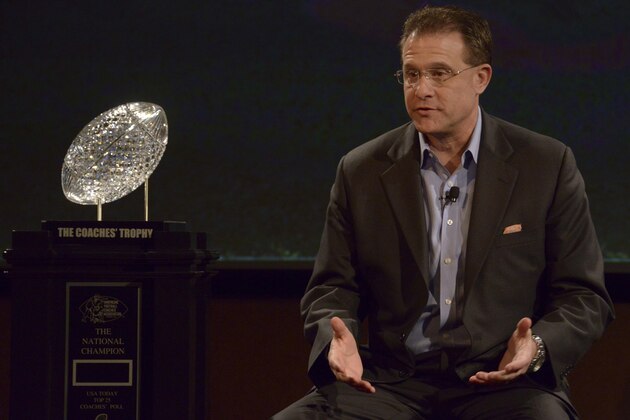 Dec 31, 2013; Anaheim, CA, USA; Auburn Tigers coach Gus Malzahn with the Coaches Trophy at a press conference for the 2014 BCS National Championship at ESPN Zone Downtown Disney. Mandatory Credit: Kirby Lee-USA TODAY Sports