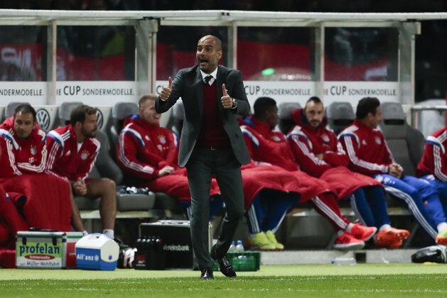 Bayern head coach Pep Guardiola of Spain reacts during the German Soccer Cup Final between FC Bayern Munich and Borussia Dortmund at the Olympic Stadium Berlin, Germany, Saturday, May 17, 2014. (AP Photo/Markus Schreiber)