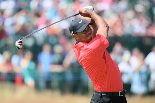HOYLAKE, ENGLAND - JULY 20: Tiger Woods of the United States hits his second shot on the 18th hole during the final round of The 143rd Open Championship at Royal Liverpool on July 20, 2014 in Hoylake, England. (Photo by Andrew Redington/Getty Images) HOYLAKE, ENGLAND - JULY 20: Tiger Woods of the United States hits his second shot on the 18th hole during the final round of The 143rd Open Championship at Royal Liverpool on July 20, 2014 in Hoylake, England. (Photo by Andrew Redington/Getty Images)