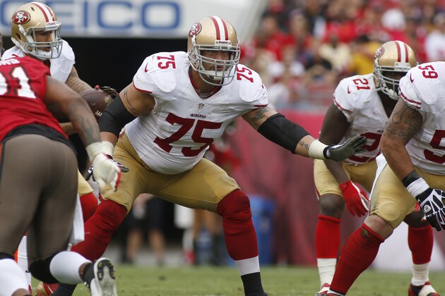 San Francisco 49ers guard Alex Boone (75) blocks during the second half of an NFL football game against the Tampa Bay Buccaneers on Sunday, Dec. 15, 2013, in Tampa, Fla. The 49ers won 33-14. (AP Photo/Reinhold Matay)