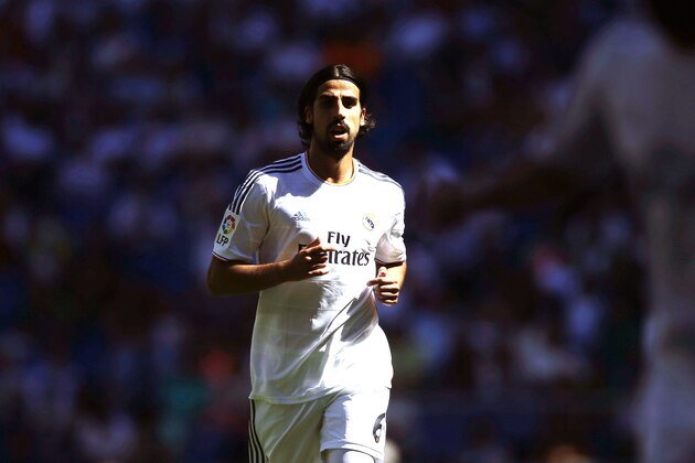 Real Madrid's Sami Khedira from Germany runs during a Spanish La Liga soccer match between Real Madrid and Espanyol at the Santiago Bernabeu stadium  in Madrid, Spain, Saturday, May 17, 2014 . (AP Photo/Daniel Ochoa de Olza)