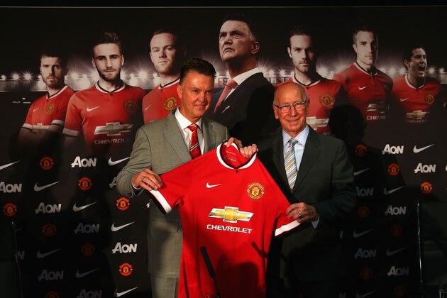 MANCHESTER, ENGLAND - JULY 17: Louis van Gaal appears at a press conference with Sir Bobby Charlton as he is unveiled as the new Manchester United manager at Old Trafford on July 17, 2014 in Manchester, England. (Photo by Clive Mason/Getty Images) MANCHESTER, ENGLAND - JULY 17: Louis van Gaal appears at a press conference with Sir Bobby Charlton as he is unveiled as the new Manchester United manager at Old Trafford on July 17, 2014 in Manchester, England. (Photo by Clive Mason/Getty Images)