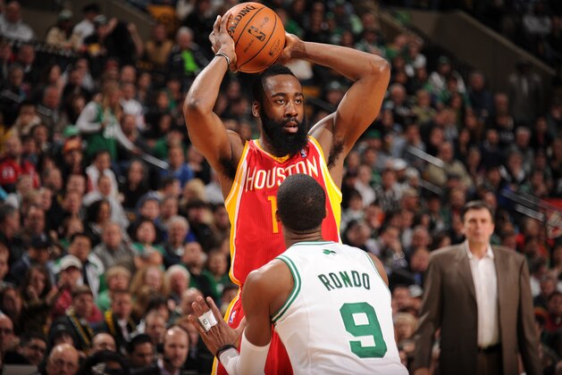 BOSTON, MA - JANUARY 11:  James Harden #13 of the Houston Rockets looks to pass the ball against Rajon Rondo #9 of the Boston Celtics on January 11, 2013 at the TD Garden in Boston, Massachusetts.  NOTE TO USER: User expressly acknowledges and agrees that, by downloading and or using this photograph, User is consenting to the terms and conditions of the Getty Images License Agreement. Mandatory Copyright Notice: Copyright 2013 NBAE  (Photo by Brian Babineau/NBAE via Getty Images)