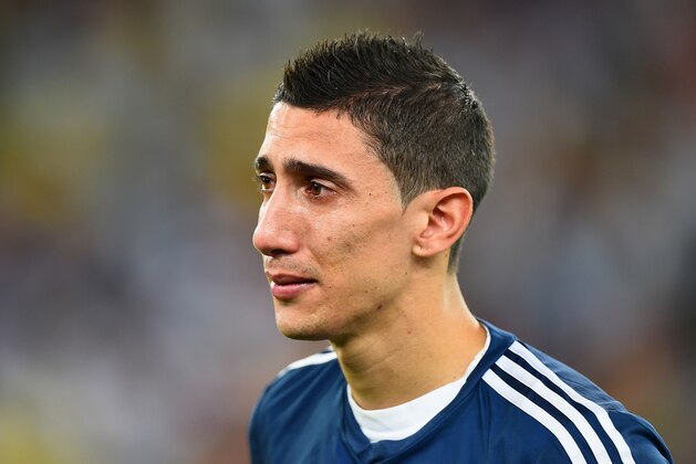 RIO DE JANEIRO, BRAZIL - JULY 13:  An emotional Angel di Maria of Argentina looks on after being defeated by Germany 1-0 in extra time during the 2014 FIFA World Cup Brazil Final match between Germany and Argentina at Maracana on July 13, 2014 in Rio de Janeiro, Brazil.  (Photo by Laurence Griffiths/Getty Images)