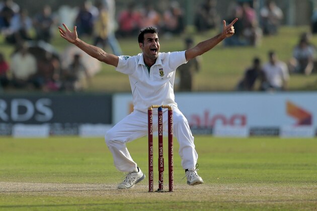 South African bowler Imran Tahir unsuccessfully appeals for the wicket of Sri Lankan batsman Angelo Mathews during the third day of the first test cricket match between Sri Lanka and South Africa  in Galle, Sri Lanka, Friday, July 18, 2014. (AP Photo/Eranga Jayawardena)