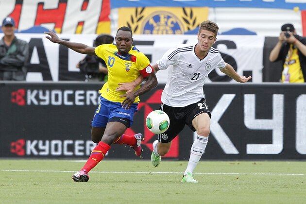 BOCA RATON, FL - MAY 29: Walter Ayovi #10 of Ecuador and Roman Neustadter #21 of Germany battle for the ball during an International friendly on May 29, 2013 at FAU Stadium in Boca Raton, Florida. (Photo by Joel Auerbach/Getty Images)