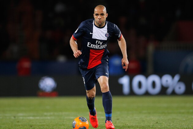 PARIS, FRANCE - MAY 07:  Alex of PSG in action during the Ligue 1 match between Paris Saint-Germain FC and Stade Rennais FC at Parc des Princes on May 7, 2014 in Paris, France.  (Photo by Dean Mouhtaropoulos/Getty Images)