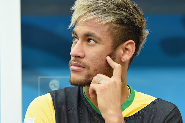 BRASILIA, BRAZIL - JULY 12:  An injured Neymar of Brazil looks on from the bench during the 2014 FIFA World Cup Brazil Third Place Playoff match between Brazil and the Netherlands at Estadio Nacional on July 12, 2014 in Brasilia, Brazil.  (Photo by Buda Mendes/Getty Images)