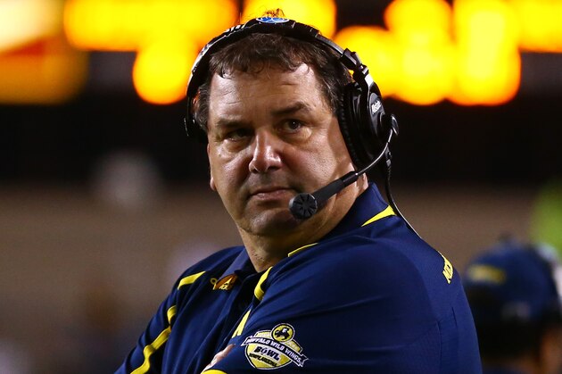 Dec 28, 2013; Tempe, AZ, USA; Michigan Wolverines head coach Brady Hoke in the second half against the Kansas State Wildcats during the Buffalo Wild Wings Bowl at Sun Devil Stadium. Kansas State defeated Michigan 31-14. Mandatory Credit: Mark J. Rebilas-USA TODAY Sports