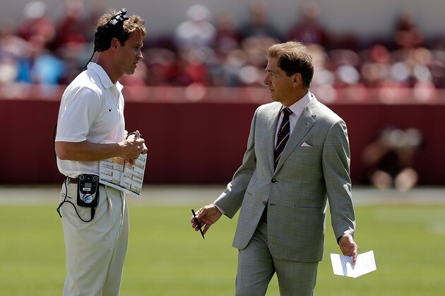 TUSCALOOSA, AL - APRIL 19:  Head coach Nick Saban of the Alabama Crimson Tide speaks with offensive coordinator Lane Kiffin during the Alabama A-Day spring game at Bryant-Denny Stadium on April 19, 2014 in Tuscaloosa, Alabama.  (Photo by Stacy Revere/Getty Images)