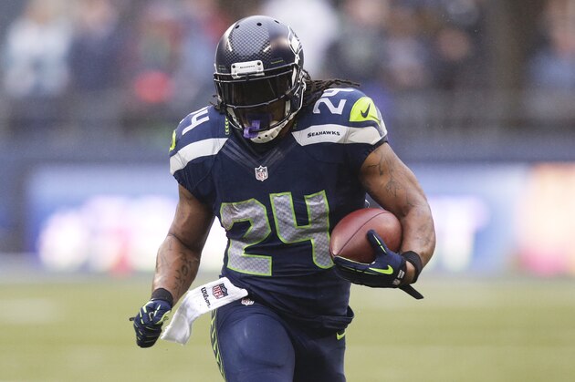 Seattle Seahawks' Marshawn Lynch rushes against the Arizona Cardinals in the first half of an NFL football game, Sunday, Dec. 22, 2013, in Seattle. (AP Photo/Stephen Brashear) Seattle Seahawks' Marshawn Lynch rushes against the Arizona Cardinals in the first half of an NFL football game, Sunday, Dec. 22, 2013, in Seattle. (AP Photo/Stephen Brashear)
