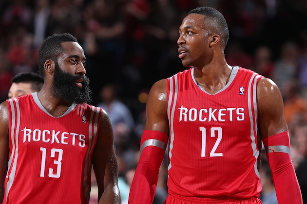 PORTLAND, OR - MAY 2: James Harden #13 and Dwight Howard #12 of the Houston Rockets during a game against the Portland Trail Blazers in Game Six of the Western Conference Quarterfinals during the 2014 NBA Playoffs on May 2, 2014 at the Moda Center in Portland, Oregon. NOTE TO USER: User expressly acknowledges and agrees that, by downloading and or using this photograph, User is consenting to the terms and conditions of the Getty Images License Agreement. Mandatory Copyright Notice: Copyright 2014 NBAE (Photo by Sam Forencich/NBAE via Getty Images)