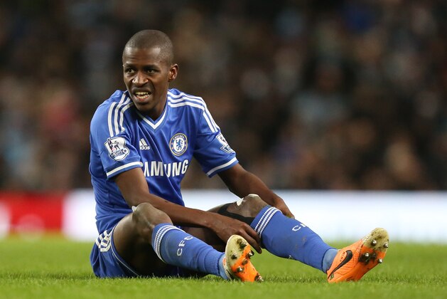 Chelsea's Ramires adjusts his socks after a foul left him on the ground during their English Premier League soccer match between Manchester City and Chelsea at the Etihad Stadium, Manchester, England, Monday Feb. 3, 2014. (AP Photo/Jon Super)