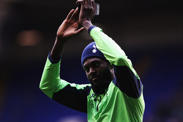 LONDON, ENGLAND - MAY 11:  Emmanuel Adebayor of Tottenham Hotspur acknowledges his sides fans following the Barclays Premier League match between Tottenham Hotspur and Aston Villa at White Hart Lane on May 11, 2014 in London, England.  (Photo by Clive Rose/Getty Images)