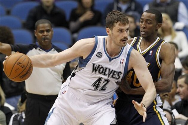 FILE - In this April 16, 2014 file photo, Minnesota Timberwolves forward Kevin Love (42) drives against Utah Jazz forward Jeremy Evans, right, during the first quarter of an NBA basketball game in Minneapolis. The Timberwolves have been talking to teams for weeks now about trading All-Star forward Kevin Love. That could happen on draft night, Thursday, June 26, when the Timberwolves hold 13th pick. (AP Photo/Ann Heisenfelt, File) FILE - In this April 16, 2014 file photo, Minnesota Timberwolves forward Kevin Love (42) drives against Utah Jazz forward Jeremy Evans, right, during the first quarter of an NBA basketball game in Minneapolis. The Timberwolves have been talking to teams for weeks now about trading All-Star forward Kevin Love. That could happen on draft night, Thursday, June 26, when the Timberwolves hold 13th pick. (AP Photo/Ann Heisenfelt, File)