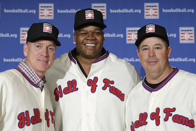 ADVANCE FOR WEEKEND EDITIONS, JULY 26-27 - FILE - In this Jan. 9, 2014 file photo, former Atlanta Braves pitchers Tom Glavine, left, and Greg Maddux, right, pose with Chicago White Sox slugger Frank Thomas after a press conference announcing their election to the 2014 Baseball Hall of Fame class in New York. Induction ceremonies are Sunday, July 27, 2014 in Cooperstown, N.Y. (AP Photo/Kathy Willens, File) ADVANCE FOR WEEKEND EDITIONS, JULY 26-27 - FILE - In this Jan. 9, 2014 file photo, former Atlanta Braves pitchers Tom Glavine, left, and Greg Maddux, right, pose with Chicago White Sox slugger Frank Thomas after a press conference announcing their election to the 2014 Baseball Hall of Fame class in New York. Induction ceremonies are Sunday, July 27, 2014 in Cooperstown, N.Y. (AP Photo/Kathy Willens, File)