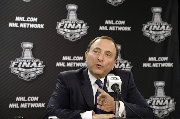 FILE - In this June 12, 2013, file photo, NHL Commissioner Gary Bettman speaks during an NHL hockey news conference in Chicago. NHL Commissioner Gary Bettman declined to comment on the impact of the NFL football concussions lawsuit last month, but he said the league has been proactive for decades in addressing head injuries. (AP Photo/Nam Y. Huh, File)