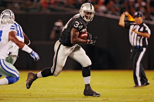 OAKLAND, CA - AUGUST 9:  Running back Latavius Murray #34 of the Oakland Raiders heads to the outside against the Dallas Cowboys in the fourth quarter of a preseason game on August 9, 2013 at O.co Coliseum in Oakland, California.  The Raiders won 19-17.  (Photo by Brian Bahr/Getty Images)