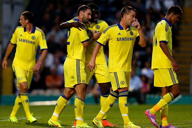 HIGH WYCOMBE, ENGLAND - JULY 16: Branislav Ivanovic of Chelsea celebrates with team mates after scoring a goal duing the pre season friendly match between Wycombe Wanderers and Chelsea at Adams Park on July 16, 2014 in High Wycombe, England.  (Photo by Ben Hoskins/Getty Images)