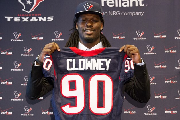 HOUSTON, TX - MAY 09:  Jadeveon Clowney displays his Houston Texans jersey as he is introduced at Reliant Stadium on May 9, 2014 in Houston, Texas. Clowney was selected by the Texans with the first overall pick in the 2014 NFL draft. (Photo by Bob Levey/Getty Images)