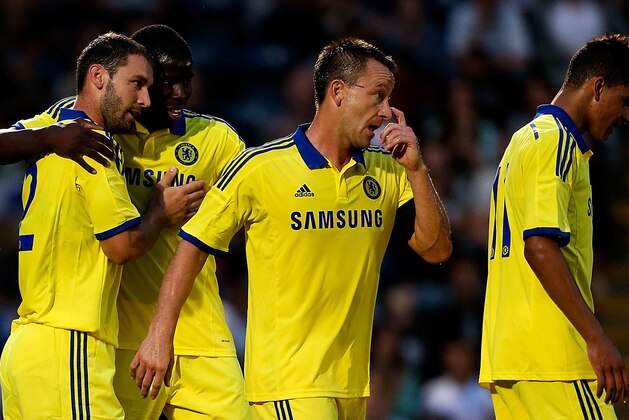 HIGH WYCOMBE, ENGLAND - JULY 16: Branislav Ivanovic of Chelsea celebrates with team mates after scoring a goal duing the pre season friendly match between Wycombe Wanderers and Chelsea at Adams Park on July 16, 2014 in High Wycombe, England.  (Photo by Ben Hoskins/Getty Images)