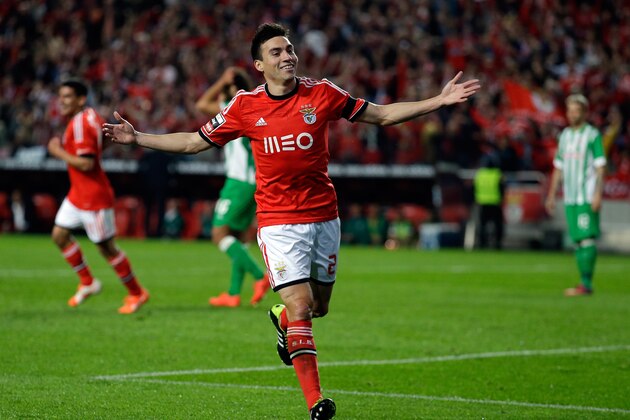 Benfica's Nico Gaitan, from Argentina, celebrates after scoring their second goal against Rio Ave during their Portuguese league soccer match Monday, April 7 2014, at Benfica's Luz stadium in Lisbon. (AP Photo/Armando Franca)