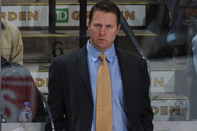BOSTON - OCTOBER 12: Head Coach Joe Sacco of the Colorado Avalanche watches the play against the Boston Bruins at the TD Garden on October 12, 2009 in Boston, Massachusetts.  (Photo by Steve Babineau/NHLI via Getty Images)