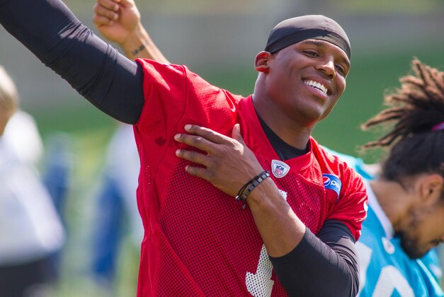 Jun 17, 2014; Charlotte, NC, USA; Carolina Panthers quarterback Cam Newton stretches during the minicamp held at the Carolina Panthers practice facility. Mandatory Credit: Jeremy Brevard-USA TODAY Sports