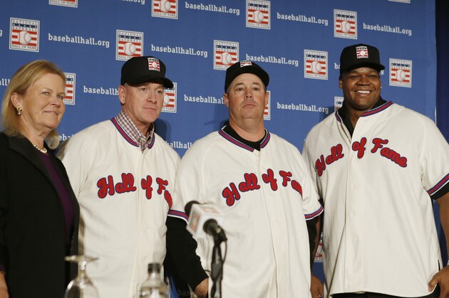 Baseball Hall of Fame owner Jane Forbes Clark, left, poses with the 2014 Baseball Hall of Fame inductees Tom Glavine, second from left, Greg Maddux, center, and Frank Thomas, right, after the trio donned their Hall of Fame caps and jerseys during a press conference Thursday, Jan. 9, 2014, in New York. Glavine and Maddux pitched for the Atlanta Braves and Thomas was a Chicago White Sox slugger. (AP Photo/Kathy Willens) Baseball Hall of Fame owner Jane Forbes Clark, left, poses with the 2014 Baseball Hall of Fame inductees Tom Glavine, second from left, Greg Maddux, center, and Frank Thomas, right, after the trio donned their Hall of Fame caps and jerseys during a press conference Thursday, Jan. 9, 2014, in New York. Glavine and Maddux pitched for the Atlanta Braves and Thomas was a Chicago White Sox slugger. (AP Photo/Kathy Willens)