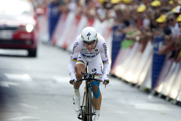 Germany's Tony Martin crosses the finish line of the twentieth stage of the Tour de France cycling race, an individual time-trial over 54 kilometers (33.6 miles) with start in Bergerac and finish in Perigueux, France, Saturday, July 26, 2014. (AP Photo/Peter Dejong) Germany's Tony Martin crosses the finish line of the twentieth stage of the Tour de France cycling race, an individual time-trial over 54 kilometers (33.6 miles) with start in Bergerac and finish in Perigueux, France, Saturday, July 26, 2014. (AP Photo/Peter Dejong)