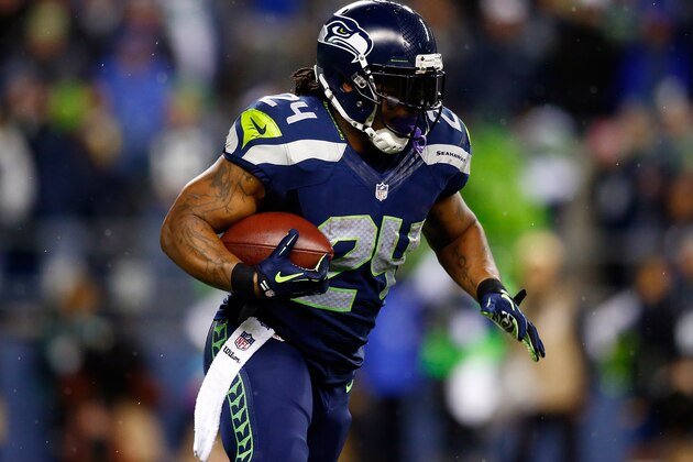 SEATTLE, WA - DECEMBER 02: Running back Marshawn Lynch #24 of the Seattle Seahawks carries the ball against the New Orleans Saints during a game at CenturyLink Field on December 2, 2013 in Seattle, Washington.  (Photo by Jonathan Ferrey/Getty Images)