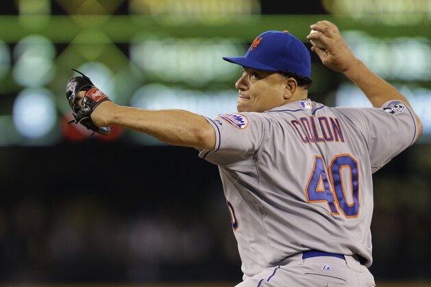 New York Mets starting pitcher Bartolo Colon throws against the Seattle Mariners during a baseball game, Wednesday, July 23, 2014 in Seattle. (AP Photo)