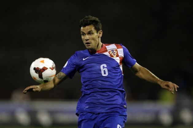 Croatia's Dejan Lovren controls the ball during his team's World Cup Group A qualifying soccer match against Serbia in Belgrade, Serbia, Friday, Sept. 6, 2013. (AP Photo/ Marko Drobnjakovic)