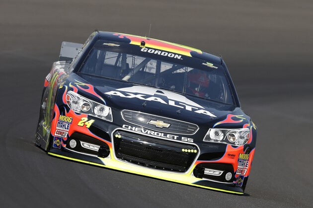 Jeff Gordon drives through turn one during practice for the Brickyard 400 Sprint Cup series auto race at the Indianapolis Motor Speedway in Indianapolis, Saturday, July 26, 2014. (AP Photo/Darron Cummings)