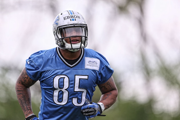 ALLEN PARK, MI - MAY 16:  Detroit Lions first round NFL Draft pick Eric Ebron #85 goes through the passing drills during Detroit Lions Rookie Minicamp on May 16, 2014 in Allen Park, Michigan.  (Photo by Leon Halip/Getty Images)