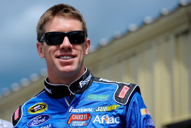 LOUDON, NH - JULY 11:  Carl Edwards, driver of the #99 Fastenal Ford, looks on in the garage area during practice for the NASCAR Sprint Cup Series Camping World RV Sales 301 at New Hampshire Motor Speedway on July 11, 2014 in Loudon, New Hampshire.  (Photo by Jared C. Tilton/Getty Images)