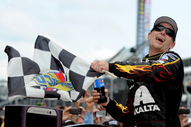 INDIANAPOLIS, IN - JULY 27:  Jeff Gordon, driver of the #24 Axalta Chevrolet, celebrates in Victory Lane after winning the NASCAR Sprint Cup Series Crown Royal Presents The John Wayne Walding 400 at the Brickyard Indianapolis Motor Speedway on July 27, 2014 in Indianapolis, Indiana.  (Photo by Rainier Ehrhardt/Getty Images)