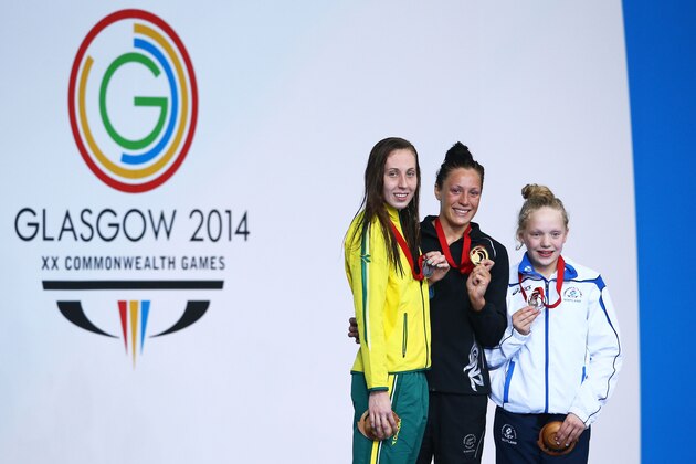 GLASGOW, SCOTLAND - JULY 27:  Gold medallist Sophie Pascoe of New Zealand poses with silver medallist Madeleine Scott of Australia and bronze medallist Erraid Davies of Scotland during the medal ceremony for the Women's 100m Breaststroke SB9 Final at Tollcross International Swimming Centre during day four of the Glasgow 2014 Commonwealth Games on July 27, 2014 in Glasgow, Scotland.  (Photo by Mark Kolbe/Getty Images)