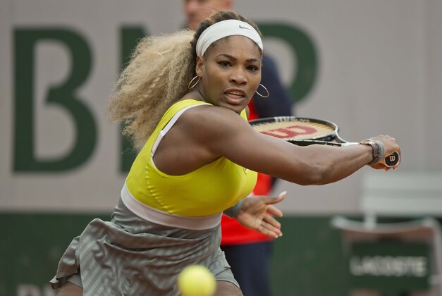 May 28, 2014; Paris, France; Serena Williams (USA) in action during her match against Garbine Muguruza (ESP) on day four at the 2014 French Open at Roland Garros. Mandatory Credit: Susan Mullane-USA TODAY Sports