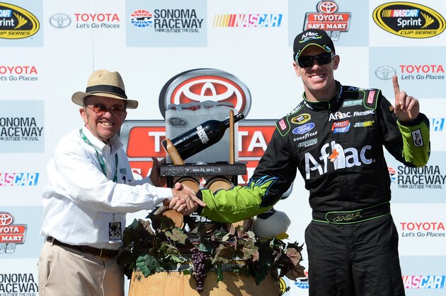 SONOMA, CA - JUNE 22:  Team owner Jack Roush and Carl Edwards, driver of the #99 Aflac Ford, celebrates in victory lane after winning the NASCAR Sprint Cup Series Toyota/Save Mart 350 at Sonoma Raceway on June 22, 2014 in Sonoma, California.  (Photo by Robert Laberge/Getty Images)