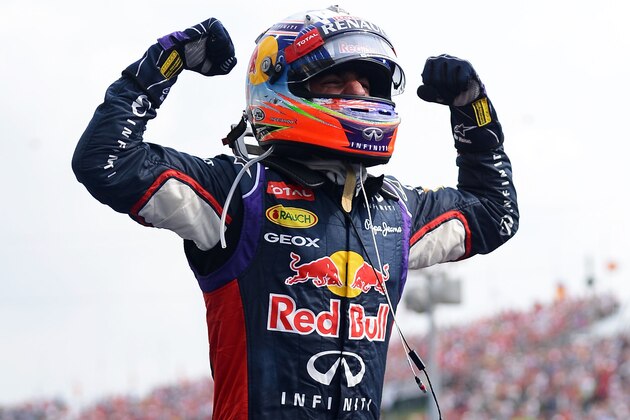 BUDAPEST, HUNGARY - JULY 27:  Daniel Ricciardo of Australia and Infiniti Red Bull Racing celebrates victory in the Hungarian Formula One Grand Prix at Hungaroring on July 27, 2014 in Budapest, Hungary.  (Photo by Lars Baron/Getty Images)