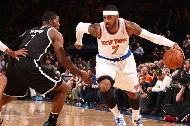 NEW YORK, NY - APRIL 02: Carmelo Anthony #7 of the New York Knicks handles the ball against the Brooklyn Nets during a game at Madison Square Garden in New York City on April 02, 2014.  NOTE TO USER: User expressly acknowledges and agrees that, by downloading and or using this photograph, User is consenting to the terms and conditions of the Getty Images License Agreement. Mandatory Copyright Notice: Copyright 2014 NBAE  (Photo by Nathaniel S. Butler/NBAE via Getty Images)