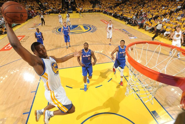 OAKLAND, CA - APRIL 24: Harrison Barnes #40 of the Golden State Warriors goes up for a dunk against the Los Angeles Clippers in Game Three of the Western Conference Quarterfinals during the 2014 NBA Playoffs on April 24, 2014 at Oracle Arena in Oakland, California. NOTE TO USER: User expressly acknowledges and agrees that, by downloading and or using this photograph, User is consenting to the terms and conditions of the Getty Images License Agreement. Mandatory Copyright Notice: Copyright 2014 NBAE (Photo by Noah Graham/NBAE via Getty Images)