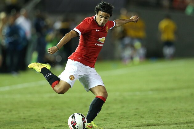 PASADENA, CA - JULY 23:  Rafael #2 of Manchester United centers the ball against the Los Angeles Galaxy at the Rose Bowl on July 23, 2014 in Pasadena, California. Manchester United won 7-0.  (Photo by Stephen Dunn/Getty Images)