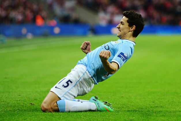 LONDON, ENGLAND - MARCH 02: Jesus Navas of Manchester City celebrates after scoring his team's third goal during the Capital One Cup Final between Manchester City and Sunderland at Wembley Stadium on March 2, 2014 in London, England. (Photo by Jamie McDonald/Getty Images) LONDON, ENGLAND - MARCH 02: Jesus Navas of Manchester City celebrates after scoring his team's third goal during the Capital One Cup Final between Manchester City and Sunderland at Wembley Stadium on March 2, 2014 in London, England. (Photo by Jamie McDonald/Getty Images)