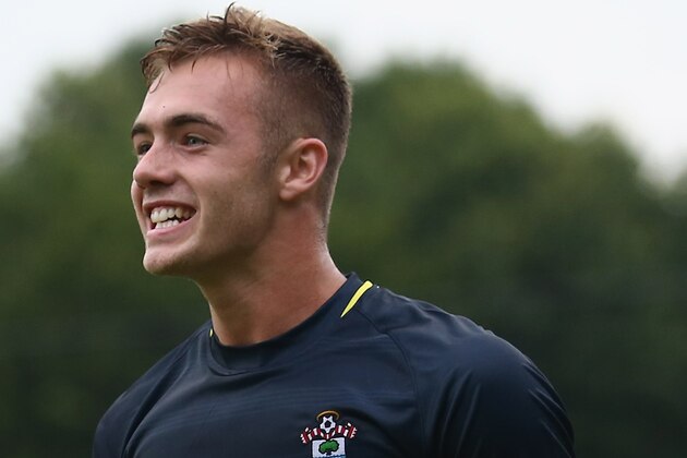 HOENSBROEK, NETHERLANDS - JULY 15:  Calum Chambers of Southampton celebrates the second goal during the pre season friendly match between EHC Hoensbroek and Southampton at Sportpark De Dem on July 15, 2014 in Hoensbroek, Netherlands.  (Photo by Christof Koepsel/Getty Images)