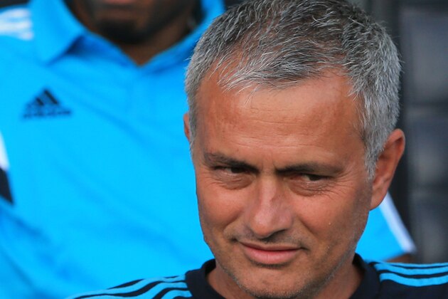LJUBLJANA, SLOVENIA - JULY 27: FC Chelsea team manager Jose Mourinho (R) looks on and Didier Drogba (L) smiles prior the Pre Season Friendly  match between FC Olimpija Ljubljana and FC Chelsea at Stozice stadium in Ljubljana, Slovenia on Sunday, July 27, 2014. (Photo by Srdjan Stevanovic/Getty Images)