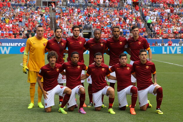 DENVER, CO - JULY 26: The starting eleven for AS Roma stand on the pitch before taking on Manchester United in an International Champions Cup match at Sports Authority Field at Mile High on July 26, 2014 in Denver, Colorado. (Photo by Justin Edmonds/Getty Images) DENVER, CO - JULY 26: The starting eleven for AS Roma stand on the pitch before taking on Manchester United in an International Champions Cup match at Sports Authority Field at Mile High on July 26, 2014 in Denver, Colorado. (Photo by Justin Edmonds/Getty Images)