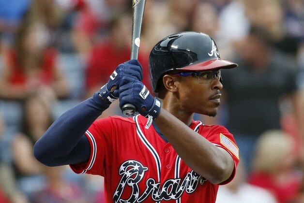 Atlanta Braves center fielder B.J. Upton (2) warms up before batting against the Philadelphia Phillies inning of a baseball game  in Atlanta, Saturday, July 19, 2014.(AP Photo/John Bazemore)