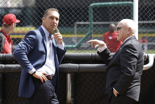 St. Louis Cardinals general manager John Mozeliak, left, talks with Cincinnati Reds general manager Walt Jocketty during batting practice prior to their opening day baseball game, Monday, March 31, 2014, in Cincinnati. (AP Photo/Al Behrman) St. Louis Cardinals general manager John Mozeliak, left, talks with Cincinnati Reds general manager Walt Jocketty during batting practice prior to their opening day baseball game, Monday, March 31, 2014, in Cincinnati. (AP Photo/Al Behrman)